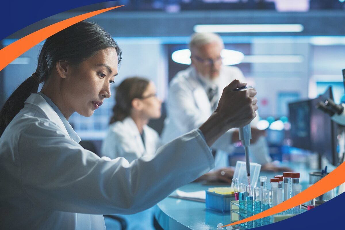 A researcher pipetting a sample in a laboratory