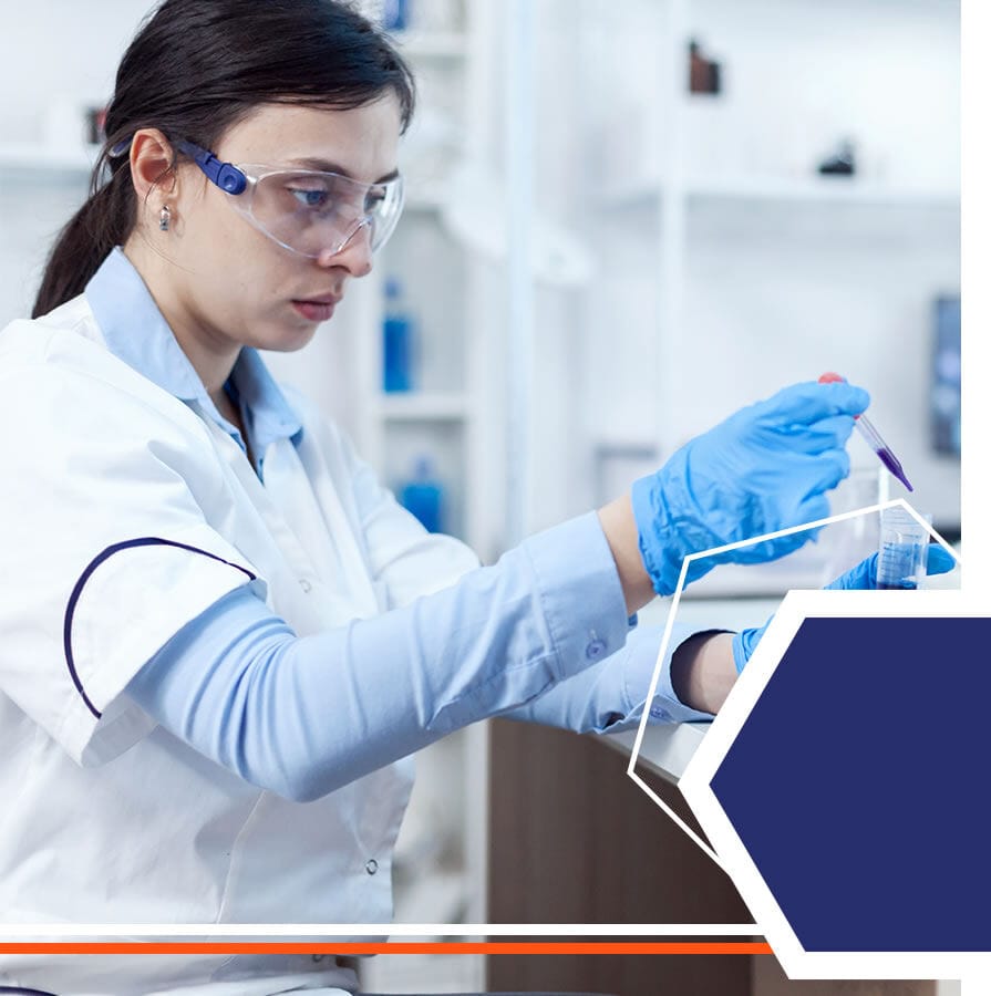 A scientist pipetting a sample in a laboratory